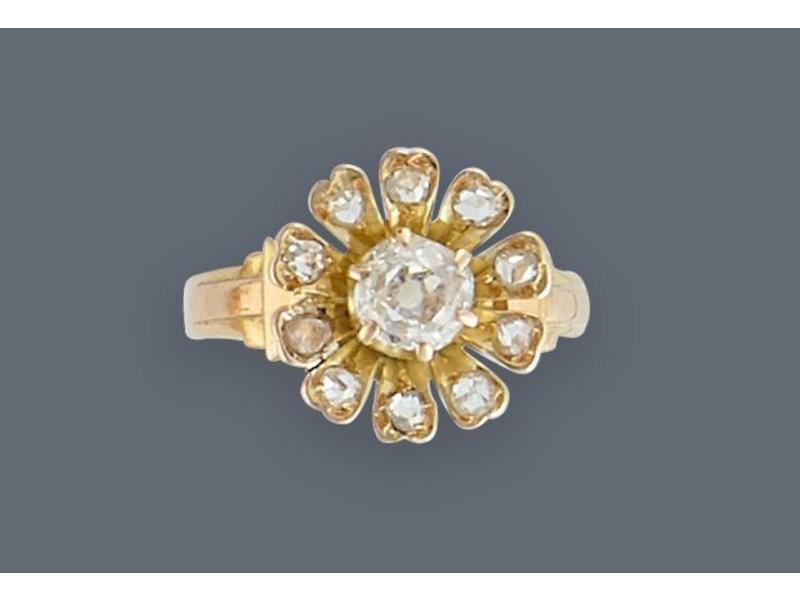 BAGUE en or jaune (750) à motif d'une fleur...
