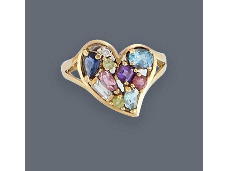 BAGUE en or jaune (750) en forme de coeur...