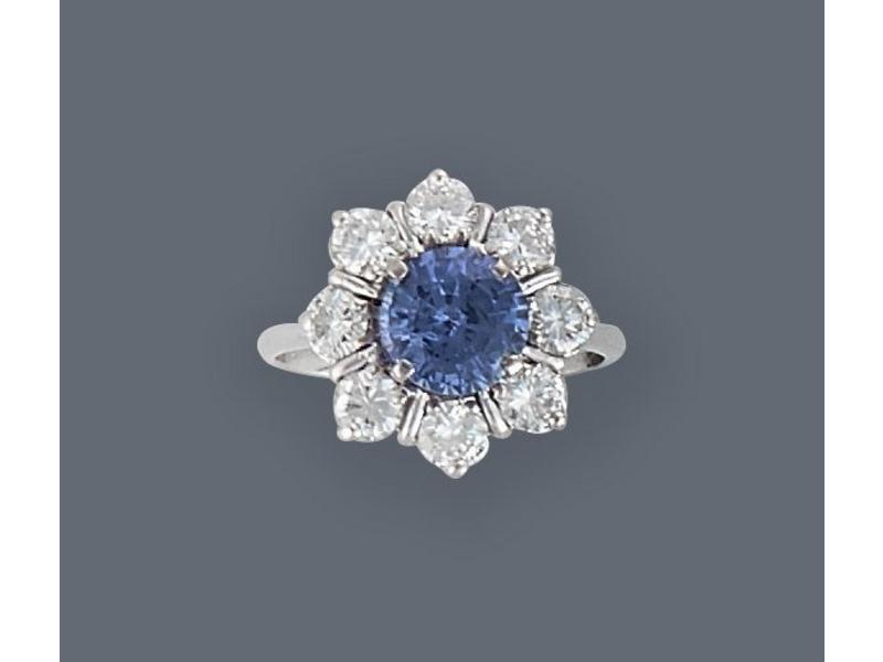 BAGUE marguerite en or gris (750) sertie...