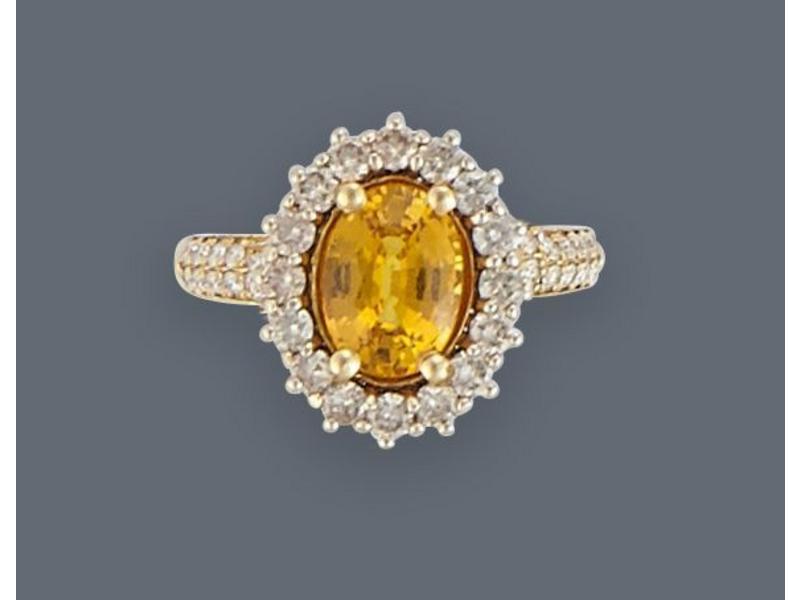 BAGUE type marguerite en or jaune (750) sertie...