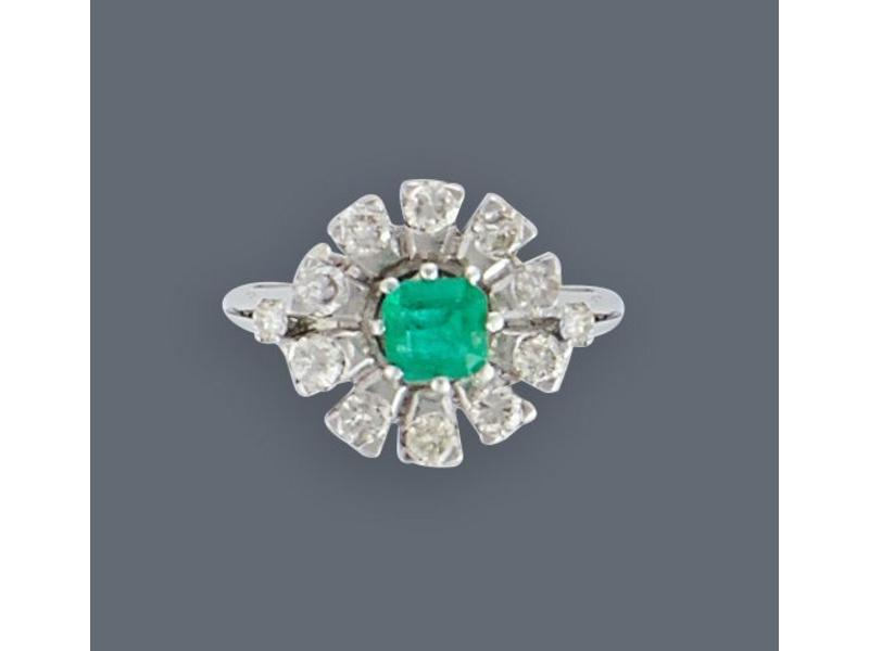 BAGUE marguerite en or gris (750) sertie...