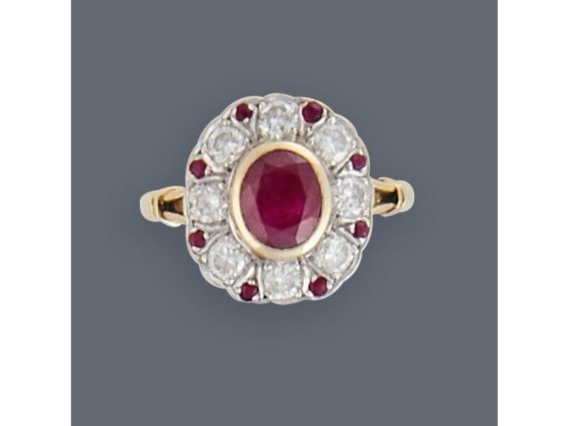 BAGUE en or jaune et gris (750) ornée d'un...