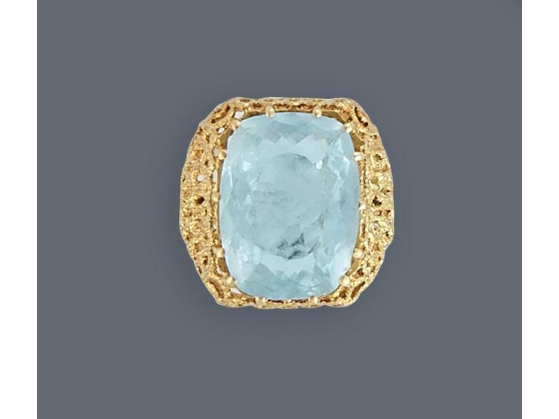 BAGUE en or jaune (750) ornée d'une aigue-marine...