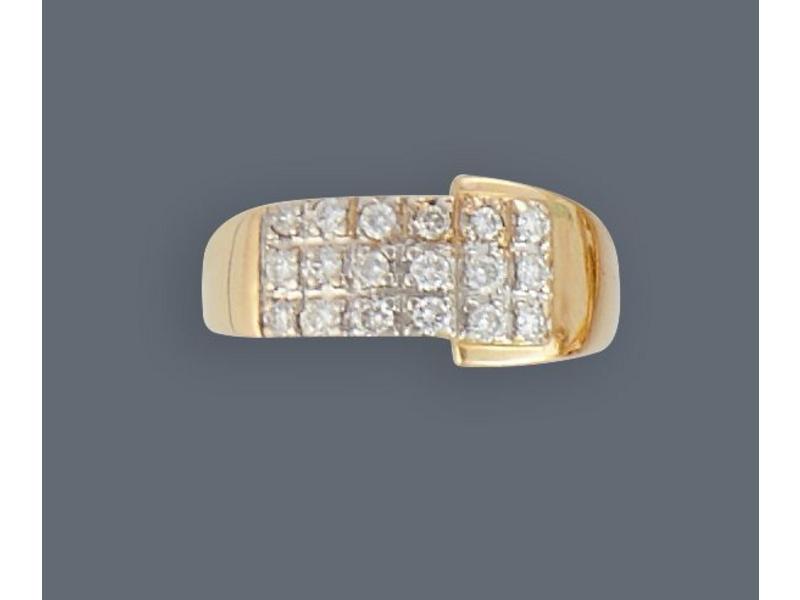 BAGUE jonc en or jaune (750) avec pavage...