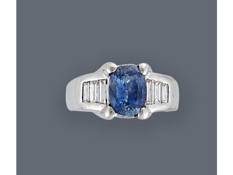 BAGUE en or gris (750) sertie d'un saphir...