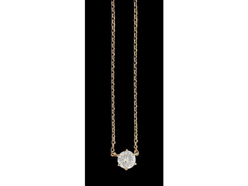 DIAMANT demi-taille brillant monté en pendentif...