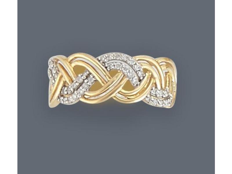 BAGUE en or jaune (750) à double joncs ajourés...