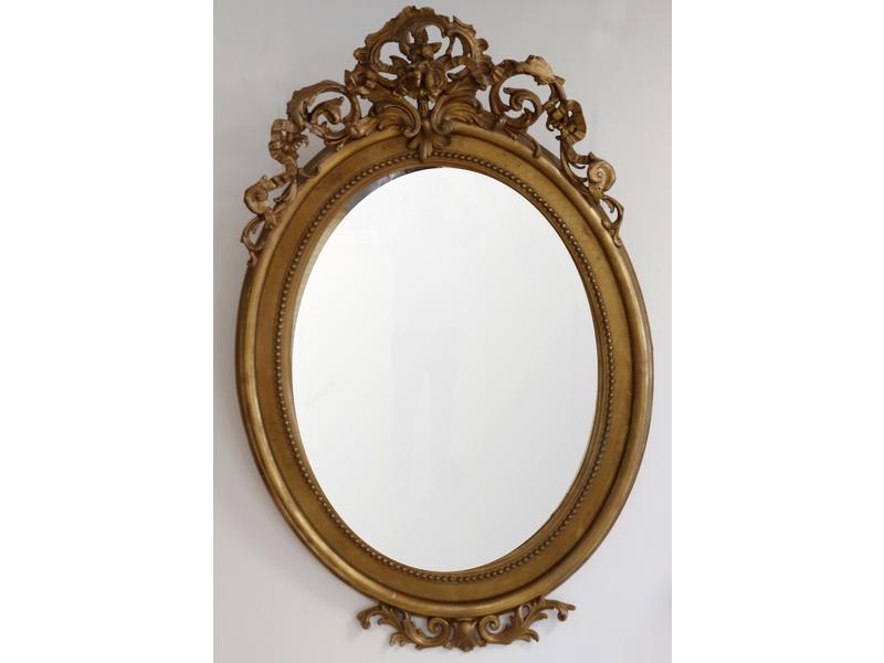 GRAND MIROIR ovale dans un cadre en bois...