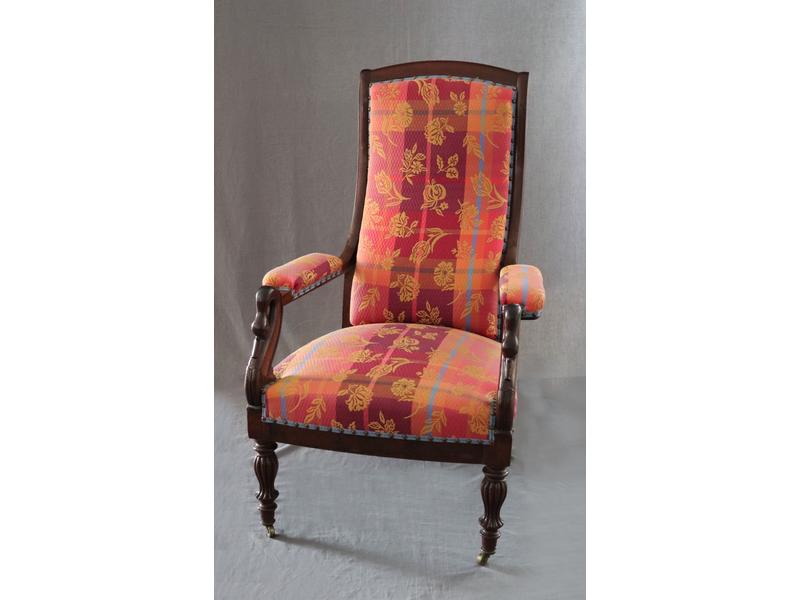 FAUTEUIL VOLTAIRE en acajou et placage d'acajou...