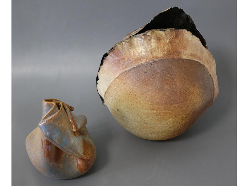 DEUX VASES en faïence émaillée brun d'inspiration...