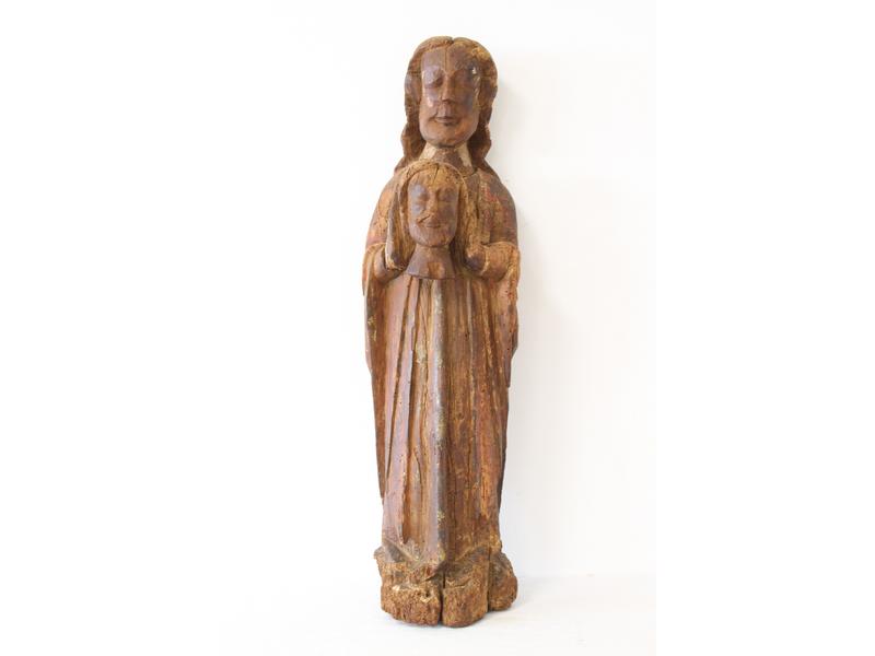 SAINT céphalophore en bois sculpté avec traces...