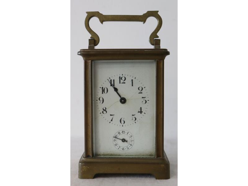 PENDULE de voyage dite d'officier, en bronze...