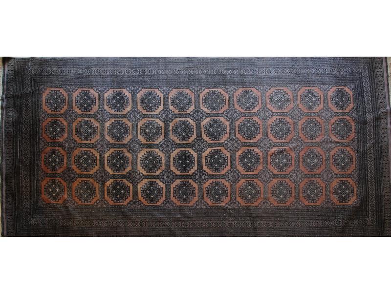 GRAND TAPIS rectangulaire à décor de gulhs...