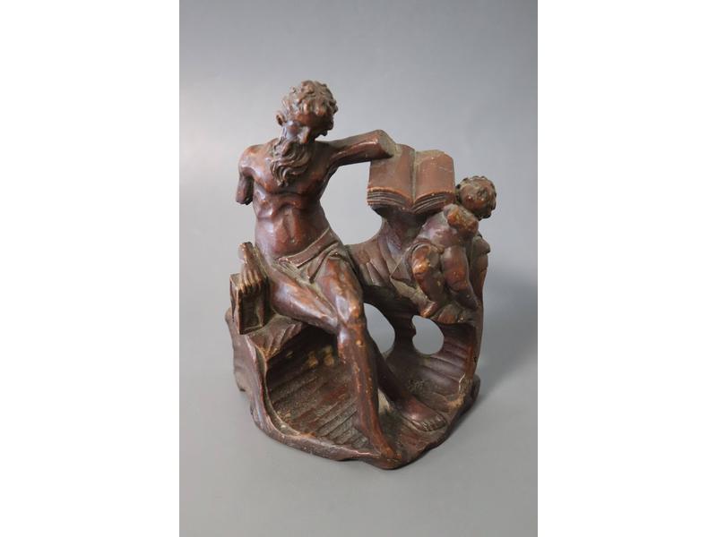 GROUPE en chêne sculpté représentant un saint...