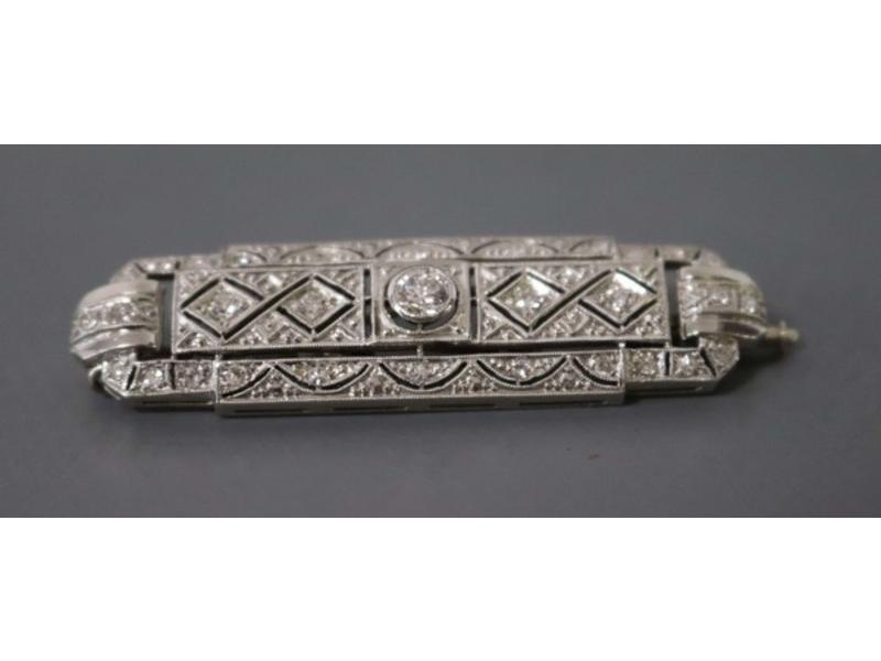 BROCHE en or gris (750mm) et platine centrée...