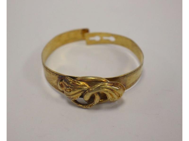 BRACELET type manchette en or jaune, à fermoir...