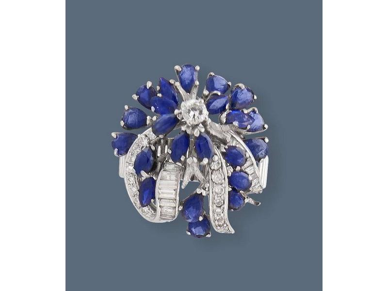 BAGUE dôme en or gris (585) ajourée stylisant...