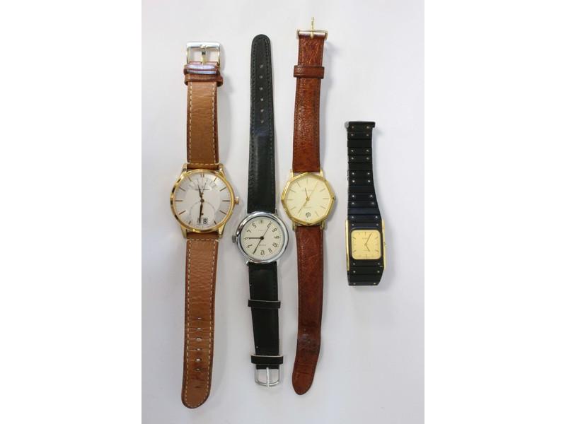 QUATRE MONTRES bracelets d'homme: