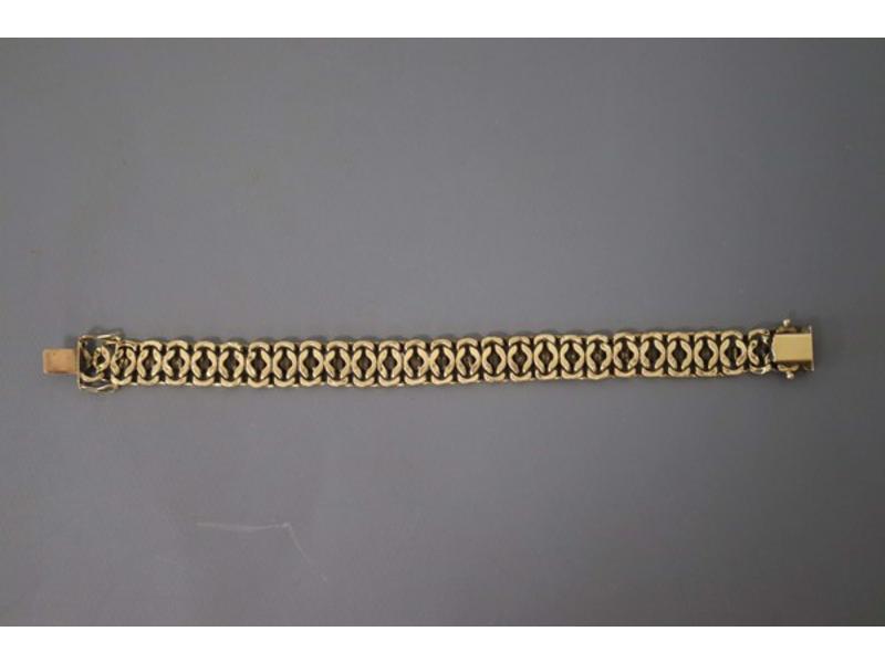 BRACELET souple en or jaune (750) à maillons...