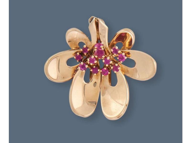 PENDENTIF-BROCHE en or jaune (750) stylisant...
