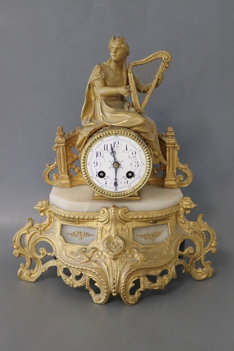 PENDULE en bronze et laiton doré et marbre...