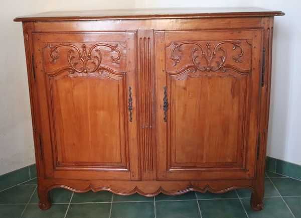 BUFFET en merisier mouluré et sculpté de...