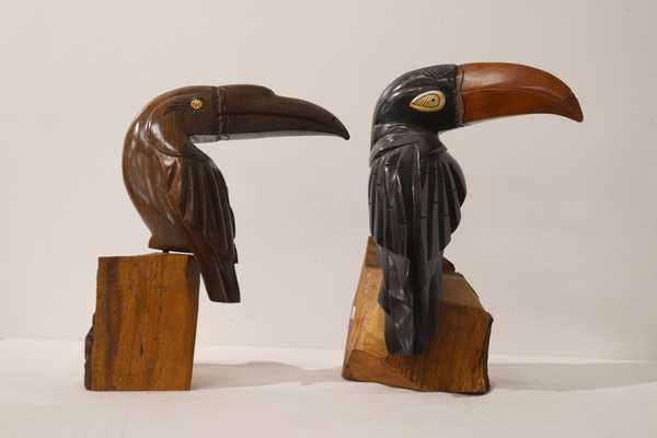 PAIRE DE TOUCANS en ébène et bois exotique...
