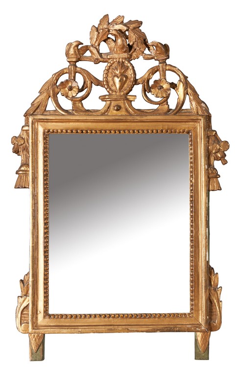 PETIT MIROIR dans un cadre en bois doré à...