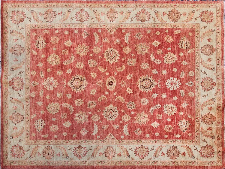 TAPIS en laine à décor floral stylisé rouge...