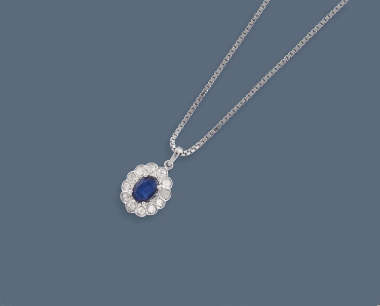 PENDENTIF de forme marguerite en or gris...
