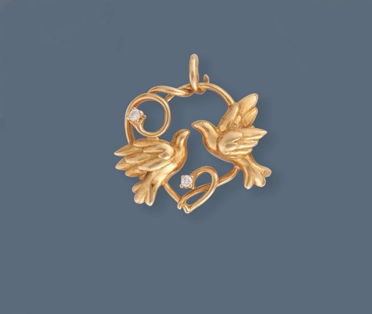 PENDENTIF en or jaune (750) figurant deux...