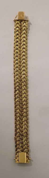 BRACELET ruban en or jaune (750) à mailles...
