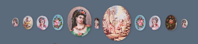ONZE ÉMAUX à profil de putti et fleurs de...