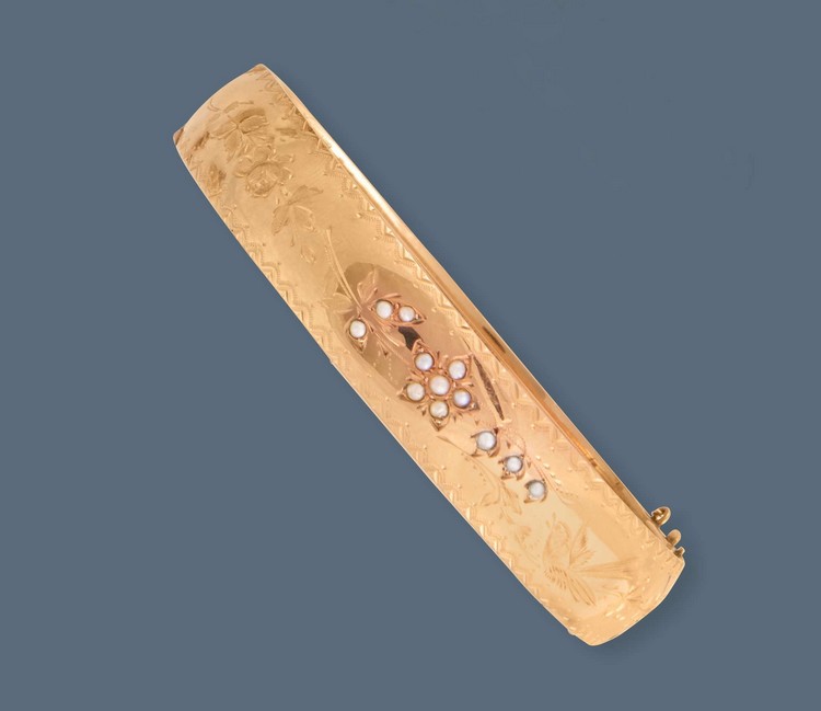 BRACELET RIGIDE en or jaune (750) serti de...