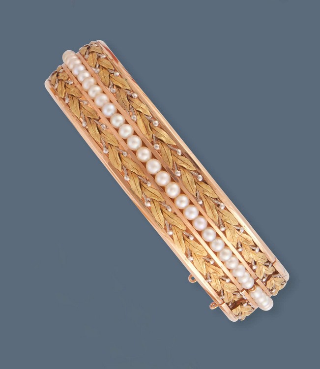 BRACELET RIGIDE en or jaune (750) articulé...