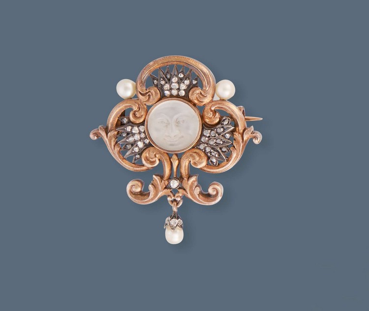 BROCHE trèfle en or jaune (750) sertie d'une...