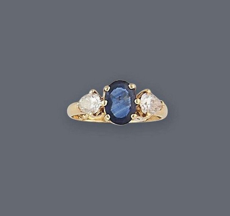 BAGUE en or jaune (750) sertie d'un saphir...
