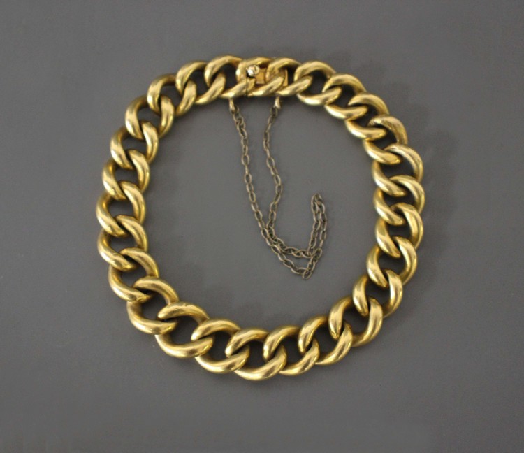 BRACELET gourmette en or jaune (750)