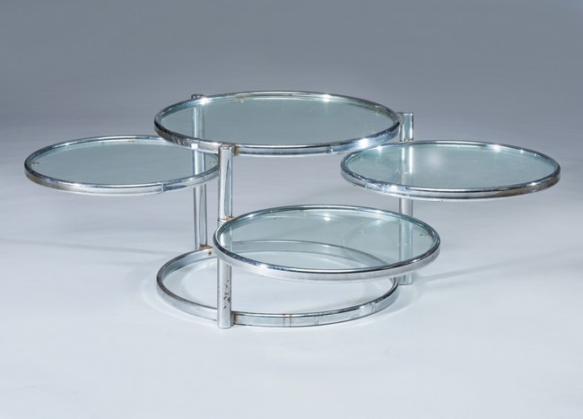 TABLE BASSE ronde en métal chromé et verre,...