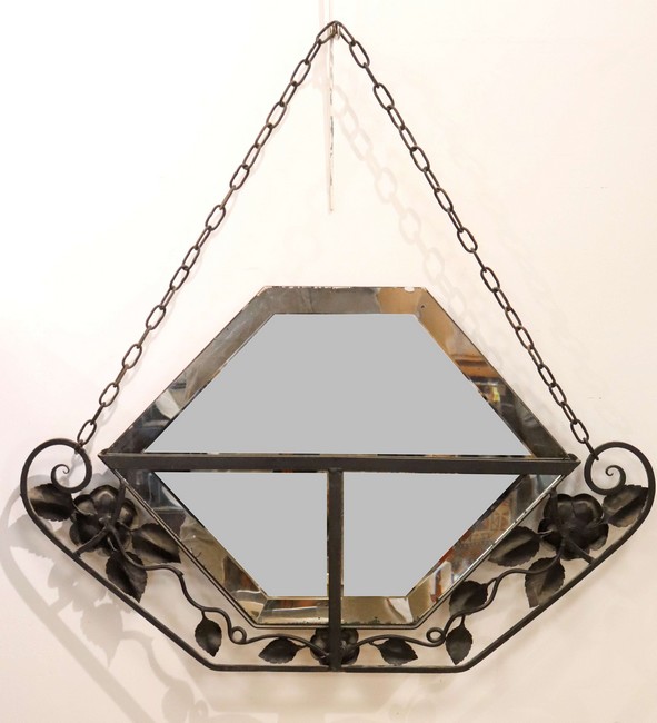 MIROIR hexagonal sur une suspension en fer...