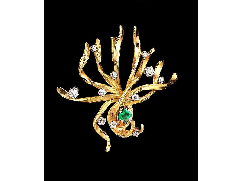BROCHE en or jaune et platine, stylisant...