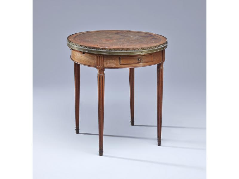 TABLE BOUILLOTTE en acajou et placage d'acajou,...