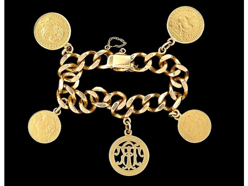 BRACELET GOURMETTE en or avec pendeloques...