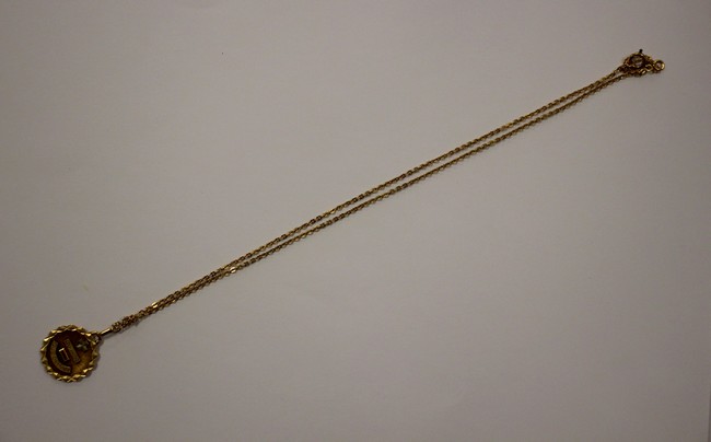CHAÎNE et MEDAILLE en or jaune (750)