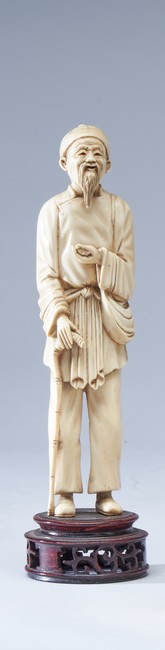 OKIMONO en ivoire sculpté représentant un...