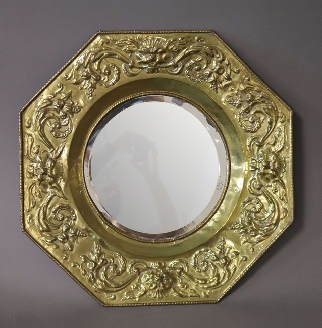 MIROIR circulaire dans un cadre octogonal...