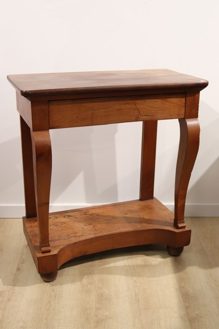 *CONSOLE en bois naturel ouvrant par un tiroir,...