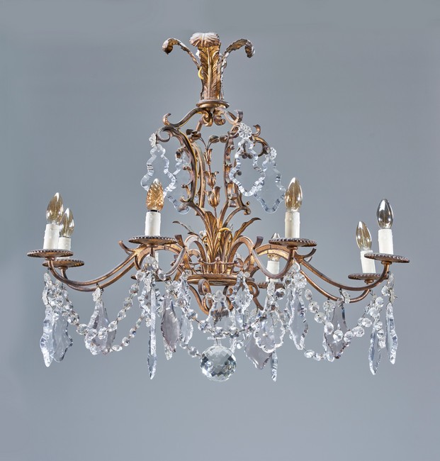 LUSTRE en bronze et tôle dorés à 8 bras de...