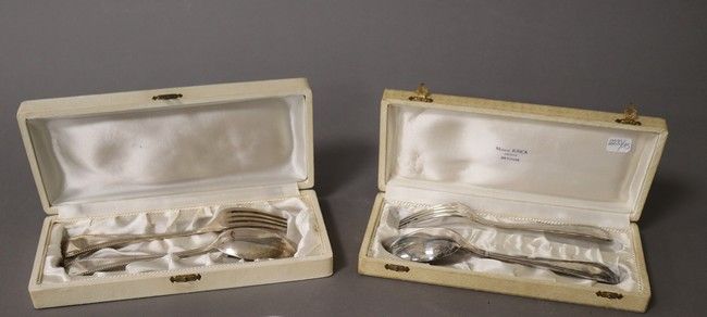 DEUX PAIRES DE COUVERTS DE NAISSANCE en métal...