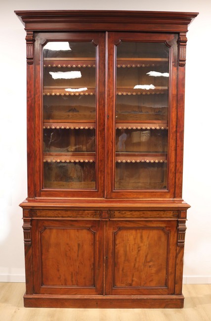 BIBLIOTHÈQUE deux corps en acajou et placage...